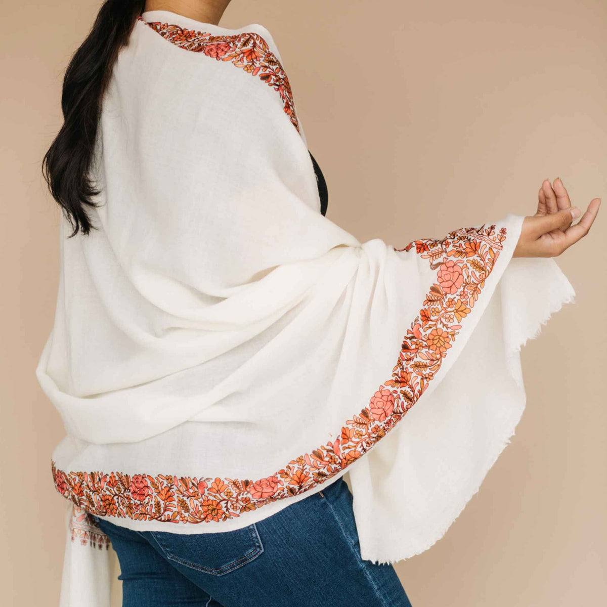 Cream wool shawl with orange embroidered border