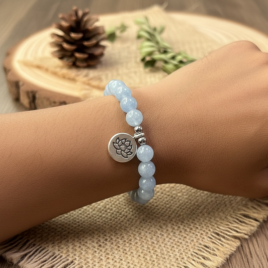 Sky-blue stone bead bracelet with silver lotus charm
