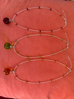 Laurie Baum original unedited photo of three hand-beaded chakra necklaces