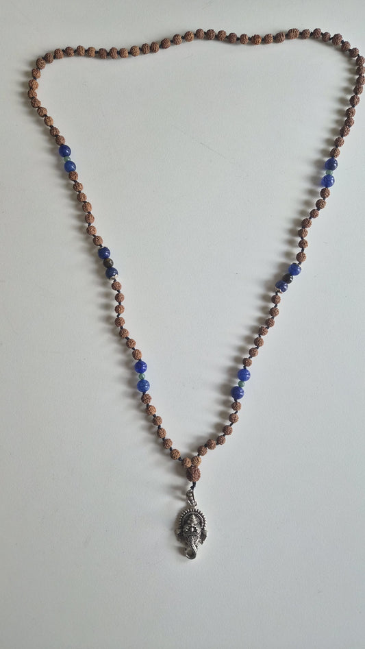 Silver Ganesha pendant on rudraksha and lapis lazuli mala