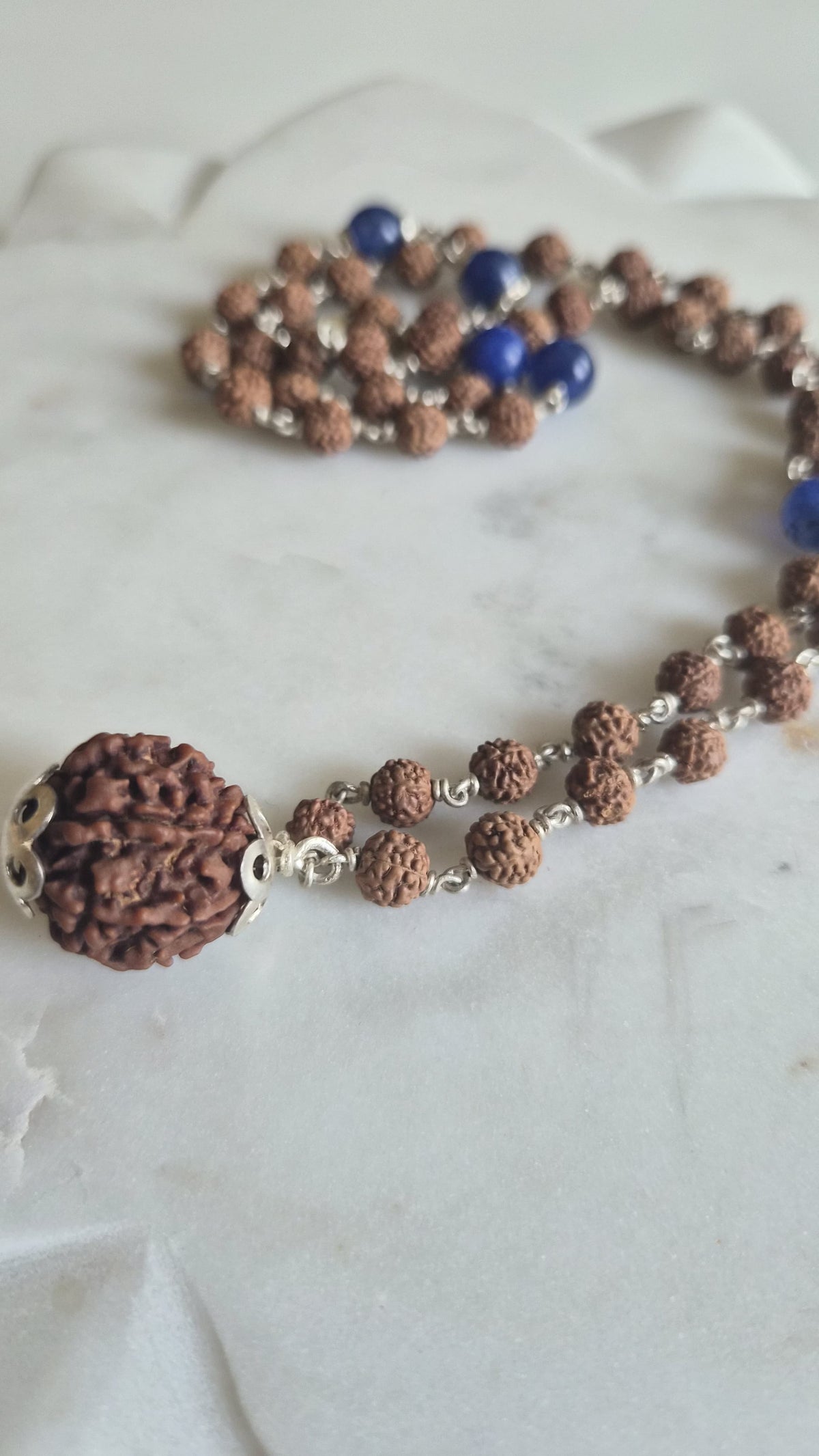Rudraksha lapis mala shown full length