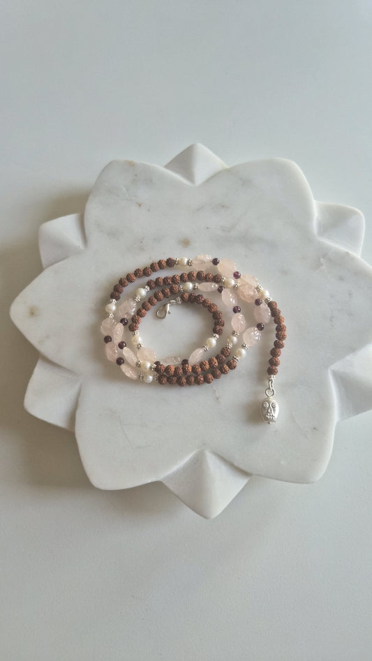 Rose quartz and freshwater pearl beads on rudraksha mala