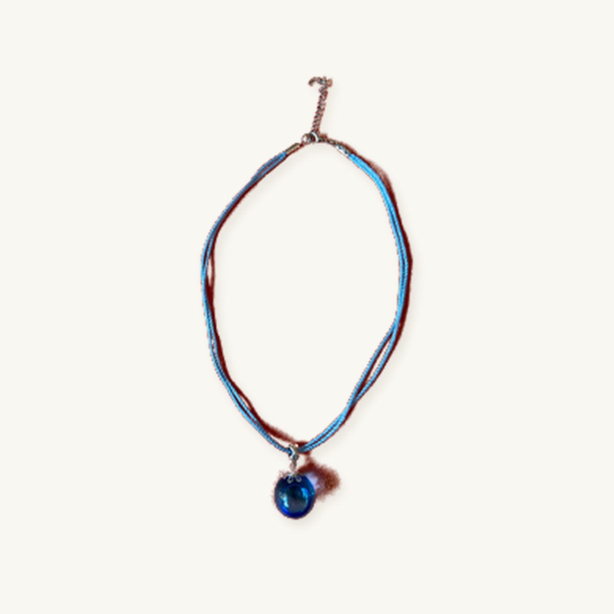 Light Blue (Throat) chakra pendant, hand-blown Venetian glass