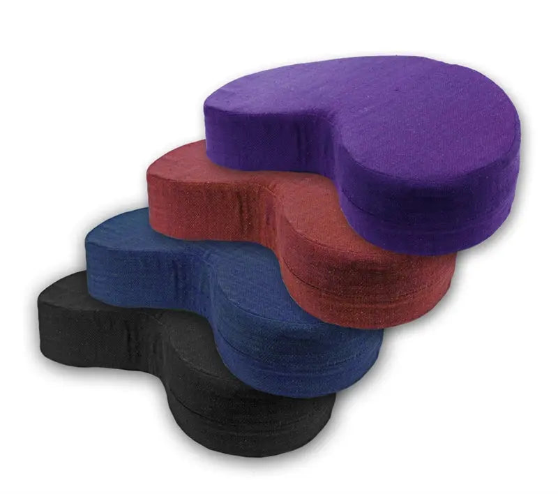 A silk and wool crescent meditation cushion for floor sitting