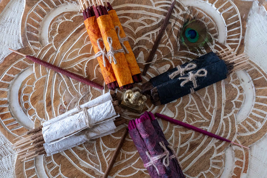 Natural handrolled incense burning in a sacred space