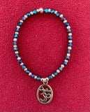 Luminous Blue & Silver Glass Beaded 7 inch / 18 cm Stretch Bracelet with OM Charm