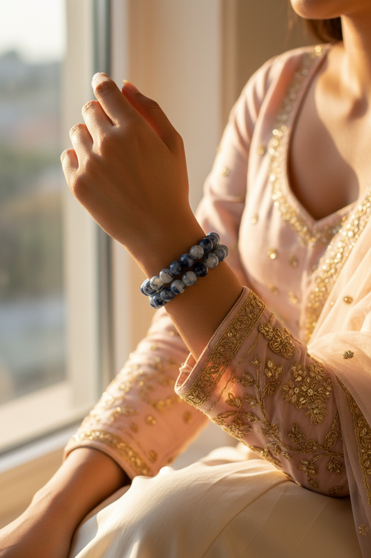 Blue-dotted white agate oval bead stretch bracelet set, two pieces