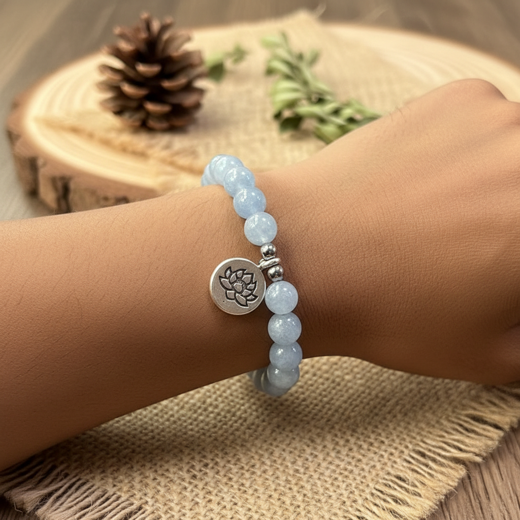 Sky-blue stone bead bracelet with silver lotus charm