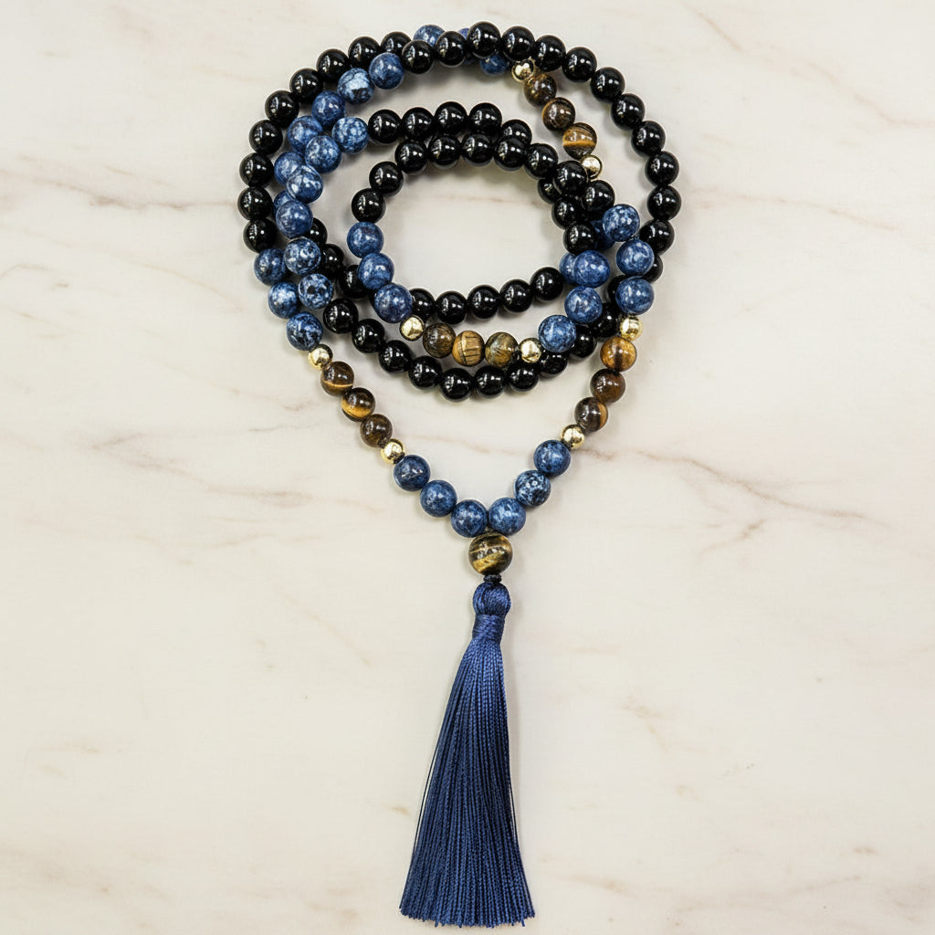 Onyx, tiger eye and sodalite mixed-stone 108-bead mala with blue tassel