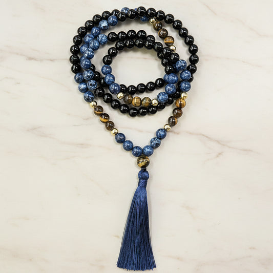 Onyx, tiger eye and sodalite mixed-stone 108-bead mala with blue tassel
