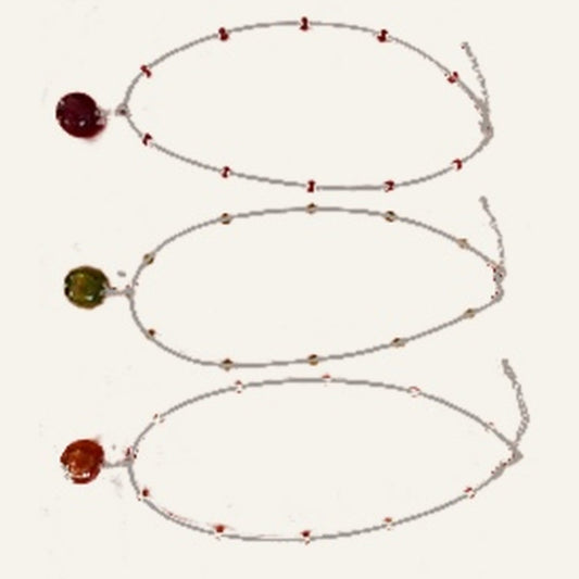 Original necklaces red, green and orange on warm ivory background